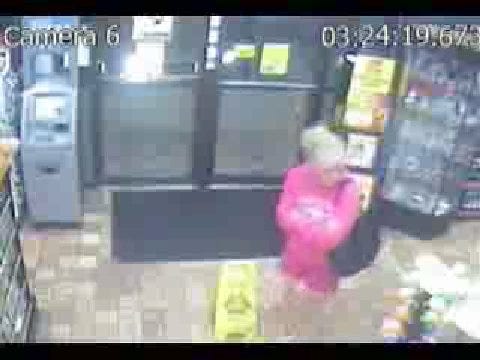 Surveillance Video Of Robbery Suspect