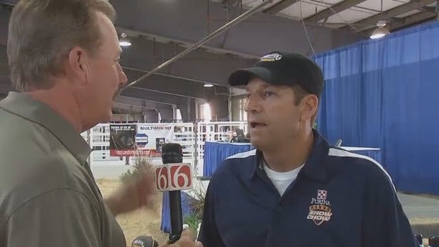 Travis Meyer Talks With A Cattle Expert At Tulsa State Fair