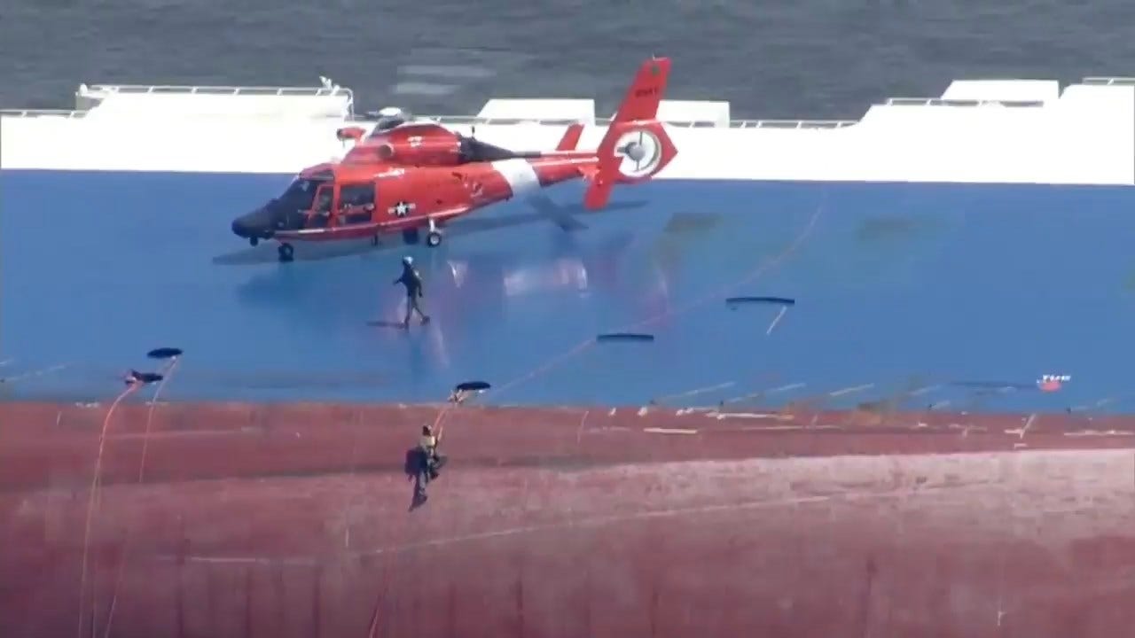 Overturned Cargo Ship's Missing Crew Members Are Alive, Coast Guard Says
