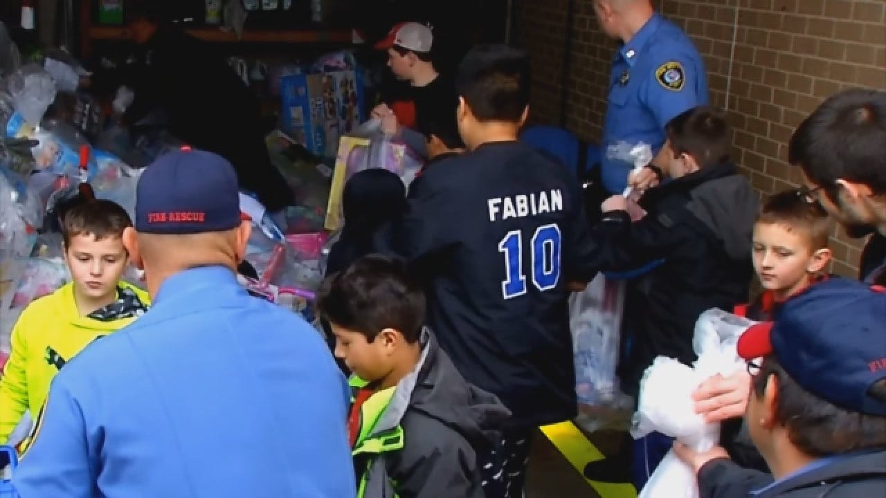 OKC Firefighters Donate Toys To Help 500 Foster Kids Have A Merry Christmas