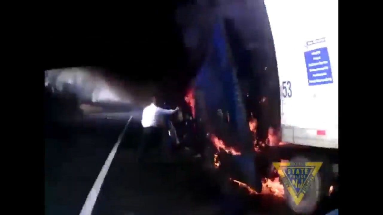 WATCH: New Jersey State Troopers Rescue Man From Burning Semi