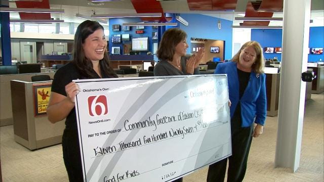 Generous Donations Help News On 6 Deliver Big Check To Food Bank