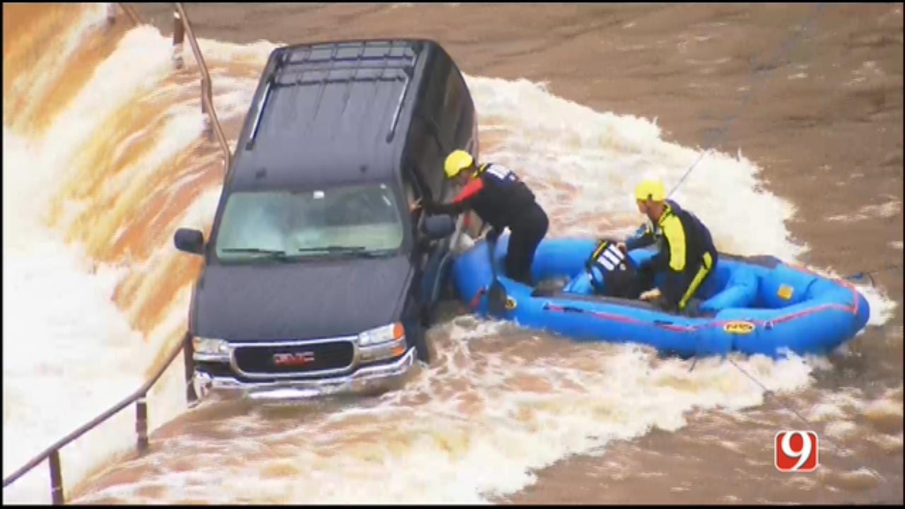 WEB EXTRA: Crews Rescue SUV Driver, Trapped On Flooded Spillway