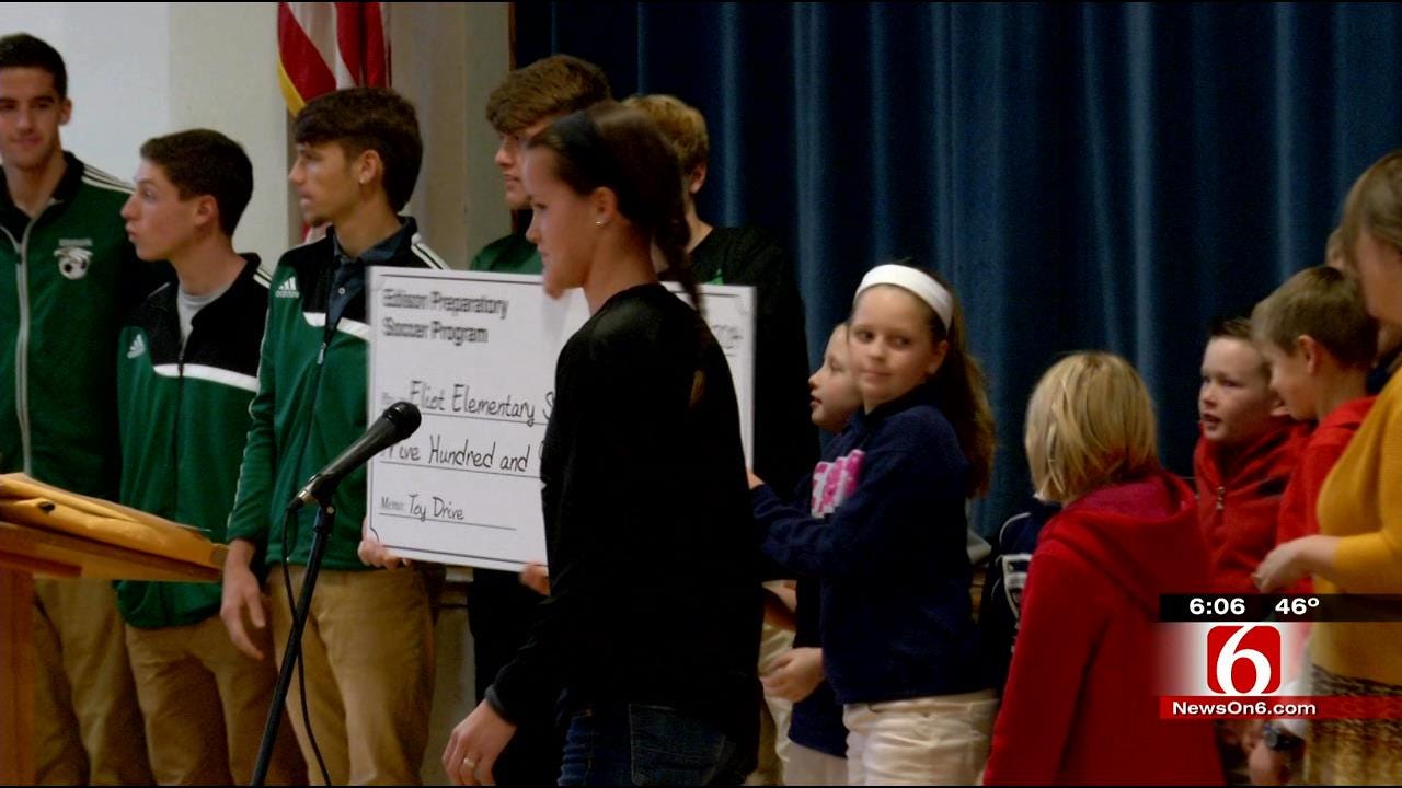 High School Soccer Team Donates To Tulsa Elementary School