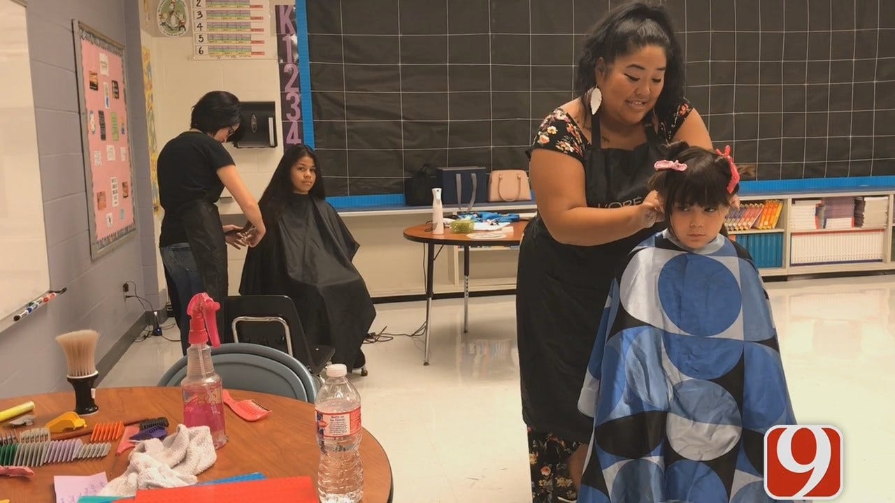 WEB EXTRA: Teachers Cut Students’ Hair For Back To School