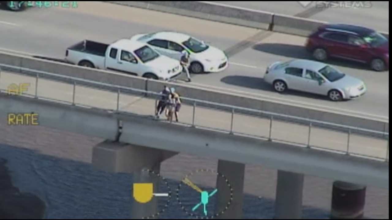 TPD Releases Video Of Men Stopping Woman From Jumping Off Bridge