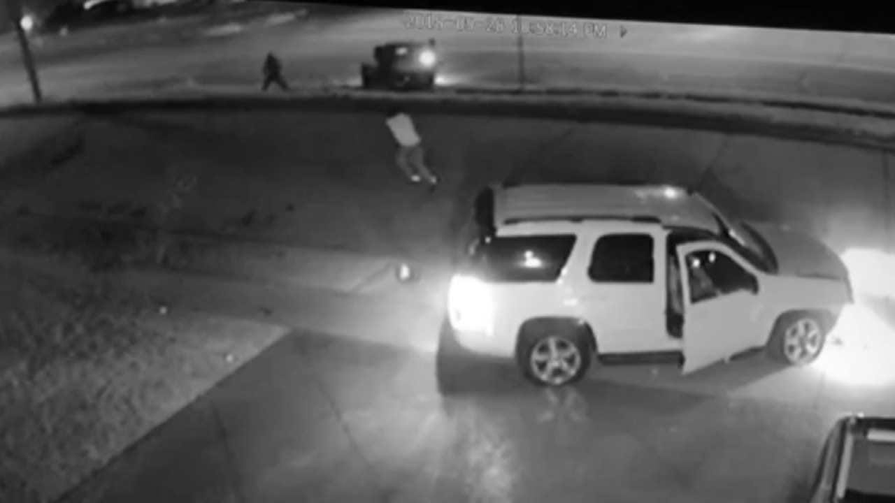 Surveillance Video: Bystander Hit When SUV Driver Opens Fire After Tulsa Chase