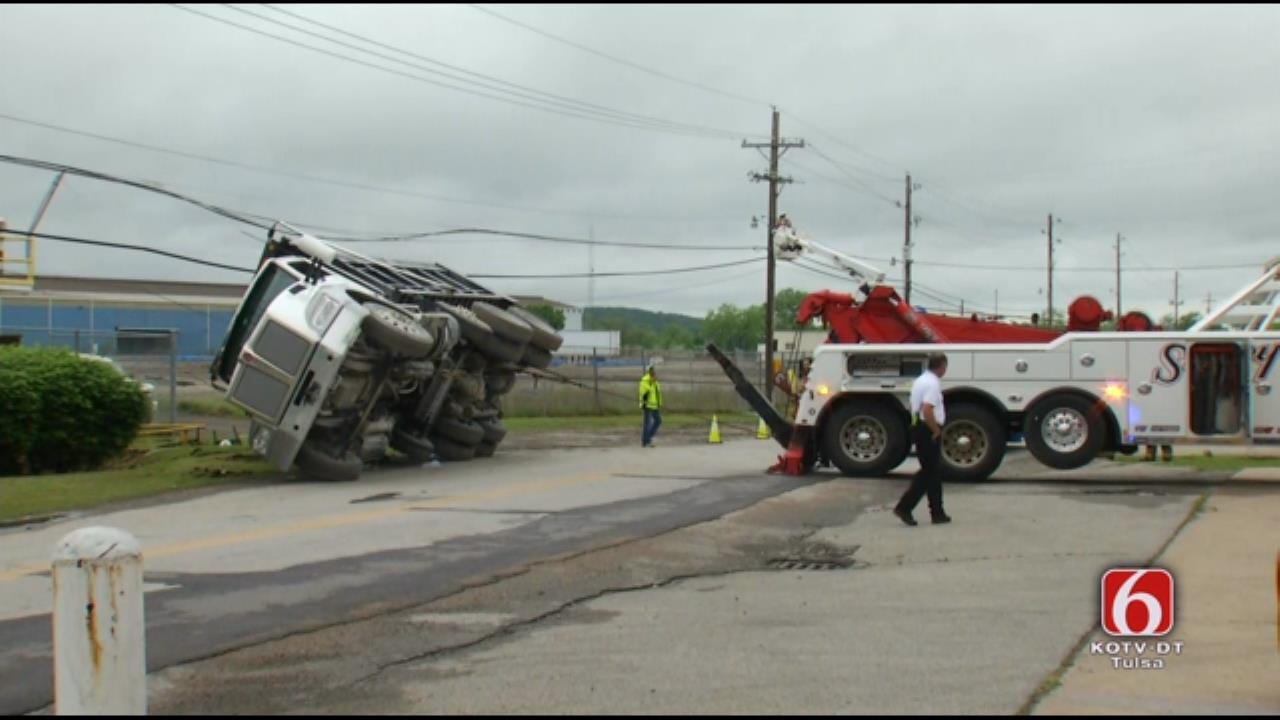 WATCH: Wrecker Crew Expertly Rights Rolled Dump Truck In Sand Springs