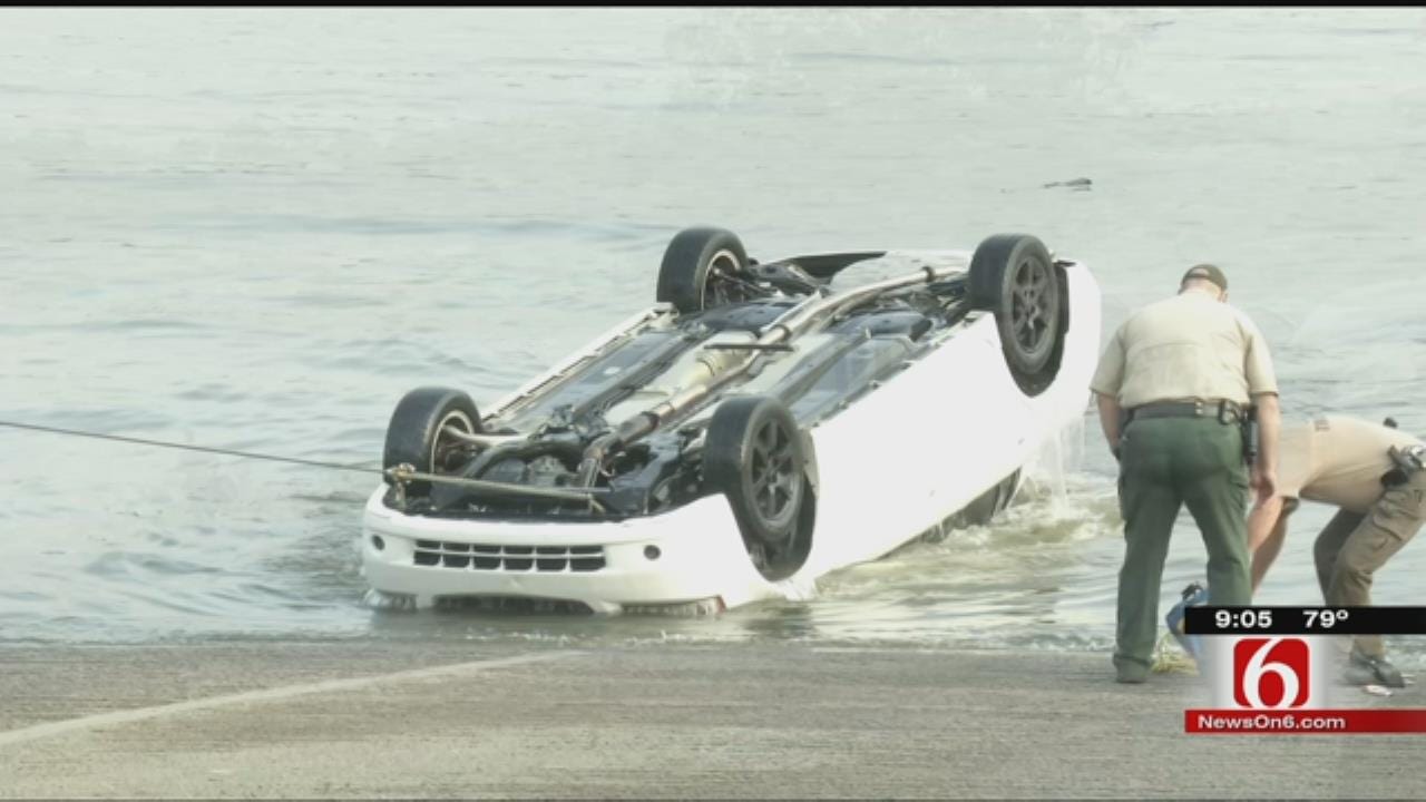 Divers Search After Car Sinks Into Keystone Lake