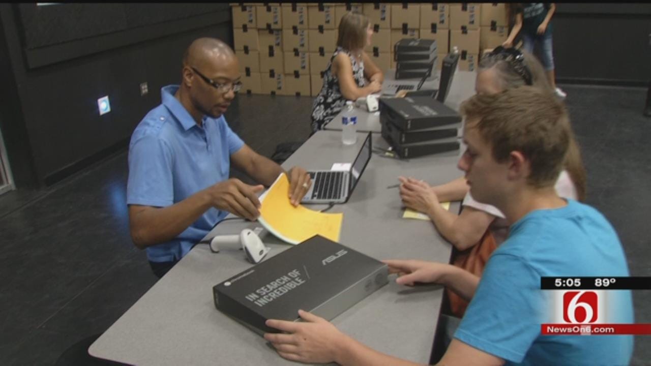 Broken Arrow School District Gives Laptops To Ninth Graders
