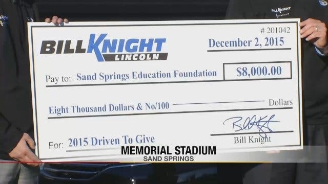 Sand Springs School Receives Check For $8,000