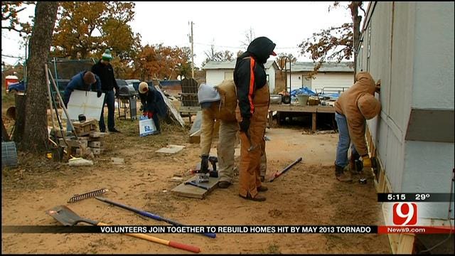 Volunteers Brave The Cold To Help Tornado Victims Rebuild