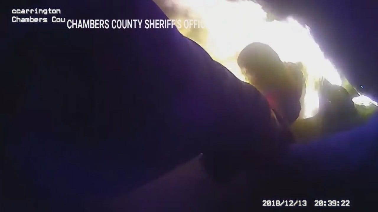 Watch: Texas Sheriff's Deputies Pull Man From Burning Car