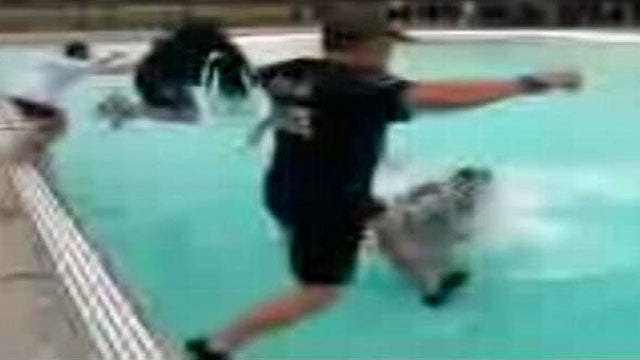 WEB EXTRA: Cellphone Video Of TPD Officers Take Polar Plunge
