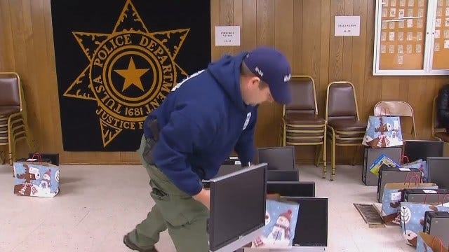 WEB EXTRA: Video Of Tulsa Police Officers Delivered Computers