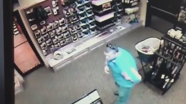 WEB EXTRA: Video Of Men Taking Gun From Store