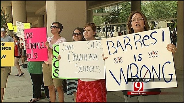 Protesters Oppose Superintendent's Budget Cuts