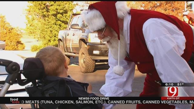 Santa Visits News 9 During 'Fill The Truck' Food Drive