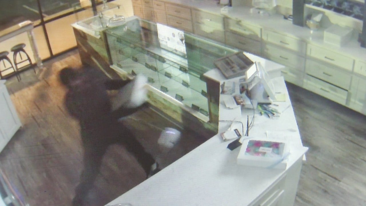 Surveillance Video Shows Man Breaking Into Tulsa Business