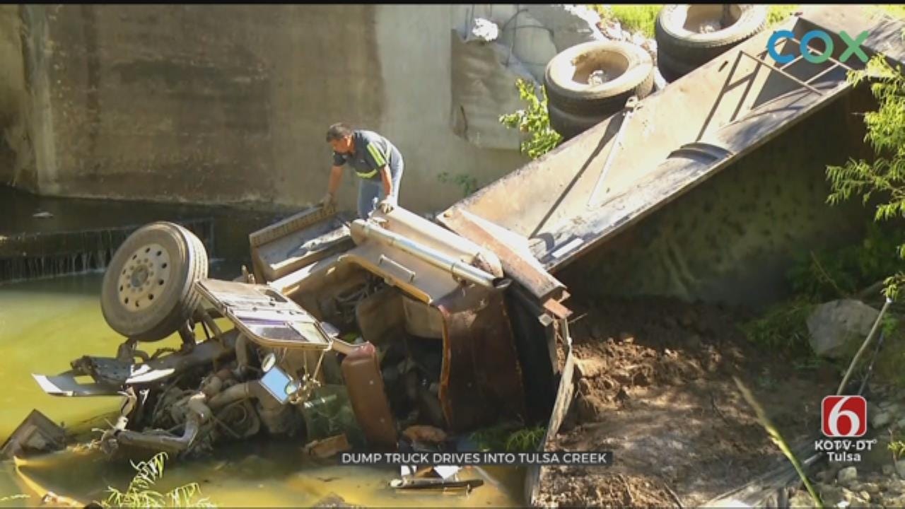 Dump Truck Crashes Into South Tulsa Creek
