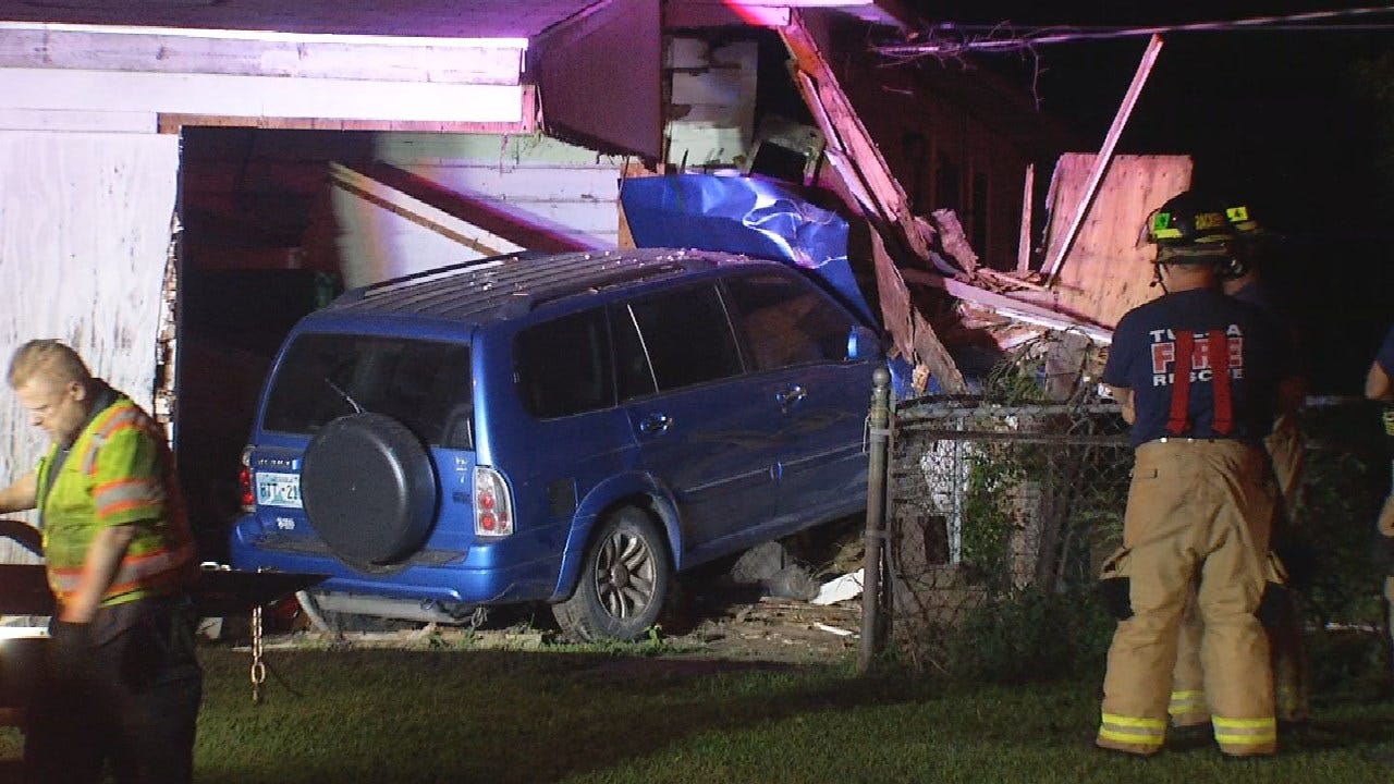 Driver Crashes SUV Through Tulsa Home