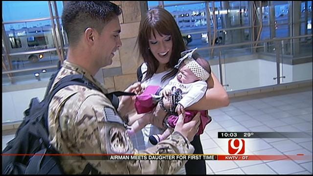 Airman Returns Home To Wife, New Baby In OKC For Christmas