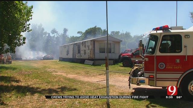 Fire Crews Try To Avoid Heat Exhaustion While Battling Fires