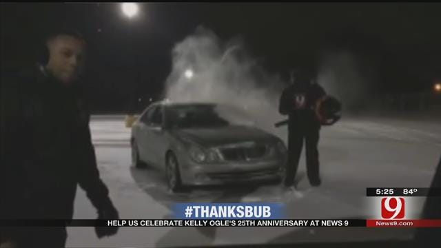 Kelly Clears Snow Off Cars At News 9