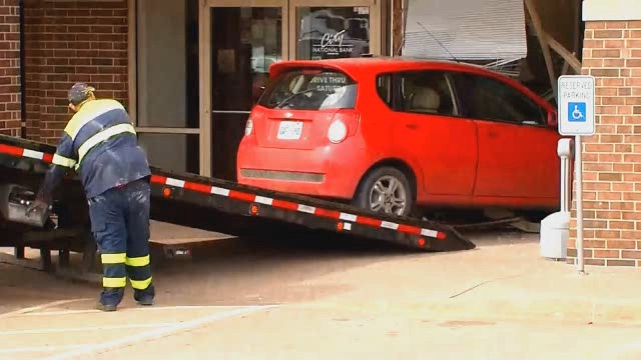 WATCH: Tow Truck Pulls Car That Crashed Into OKC Bank
