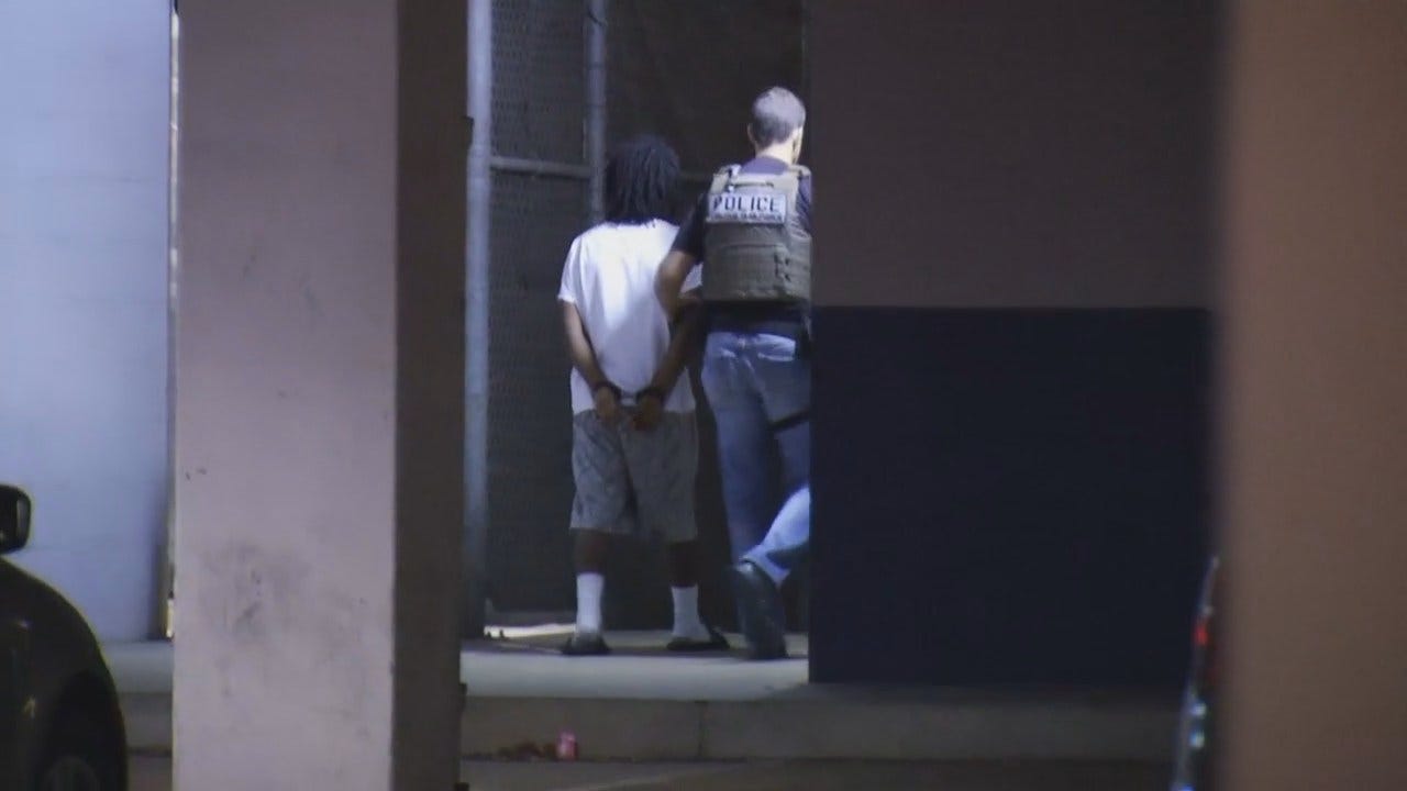 WEB EXTRA: Video Of Antonio Wilson Being Taken Into Tulsa Police Station