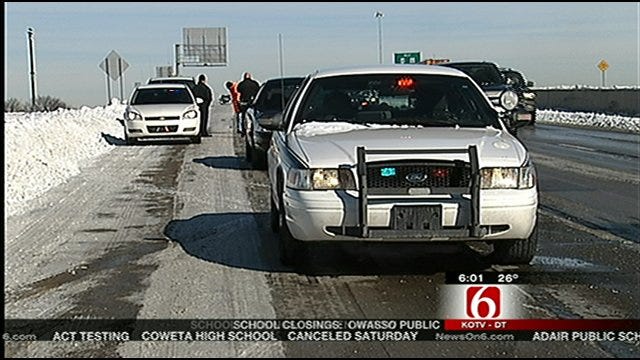 Tulsa Police Slow Traffic On U.S. 169 While ODOT Treats Ice Covered Highway