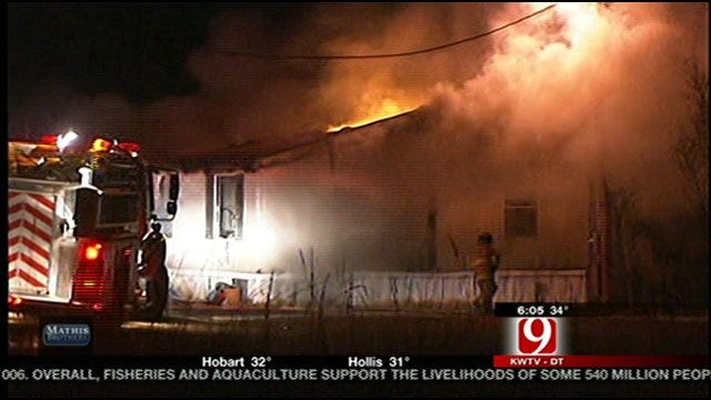 Firefighters Battle Slaughterville House Fire