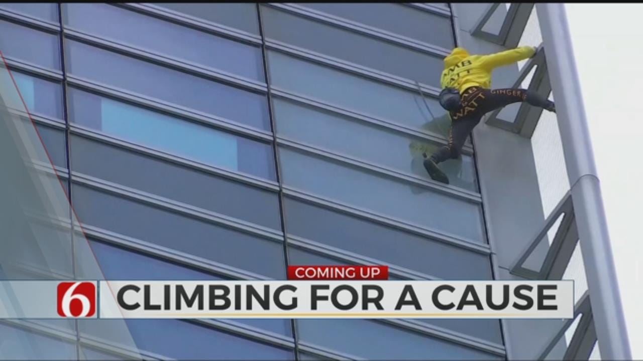 Real Life Spider-Man Climbs Building For Good Cause