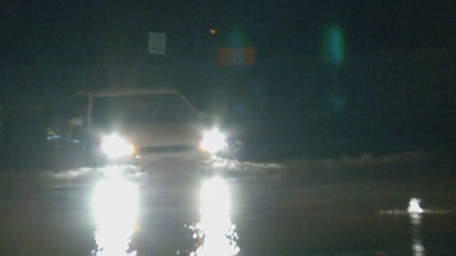 WEB EXTRA: Broken Water Line Caused Flooding; Vehicles Struggle Through