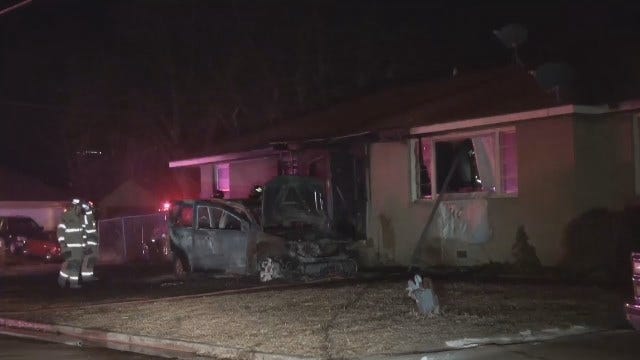 WEB EXTRA: Tulsa SUV Fire Damages Home