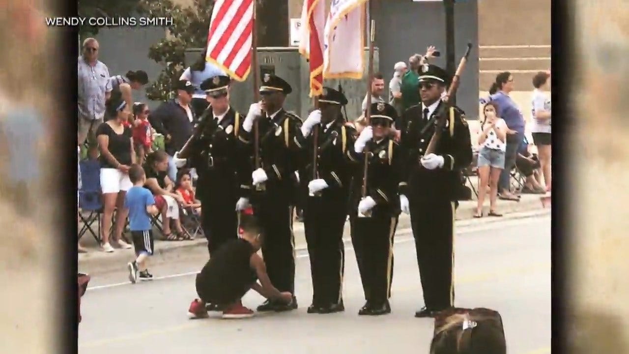 11-Year-Old Helps Honor Guard Officer Tie His Shoelaces During 4th Of July Parade