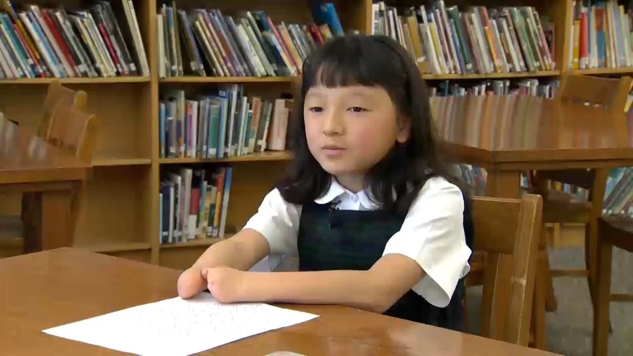 Maryland Girl Born With No Hands Wins Writing Contest