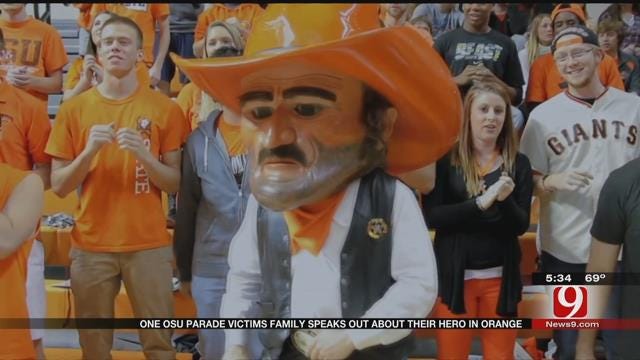 Hero In Orange Helps Young OSU Parade Victims