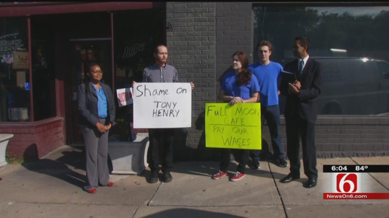 Unpaid Employees Hold Protest Outside Full Moon Café Auction