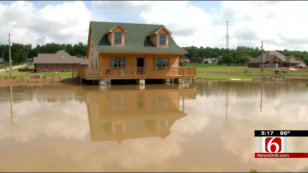 Skiatook Home Nestled Over Full Pond Thanks To Rain
