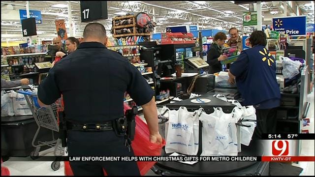 Law Enforcement Helps With Christmas Gifts For Metro Children