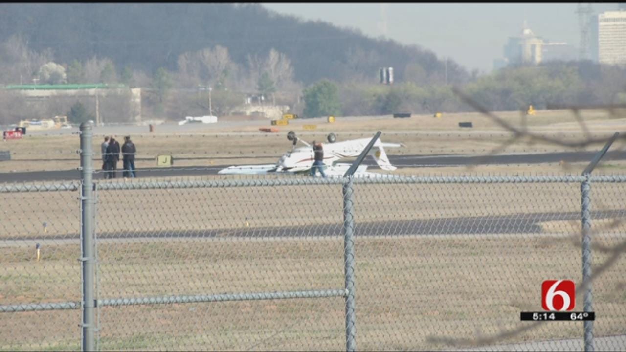 Small Plane Flips Over At Jones Riverside Airport