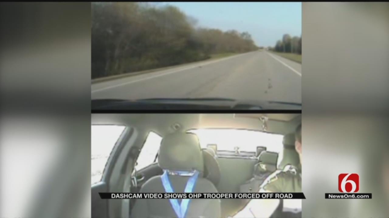 Dash Cam Video Shows Moment OHP Trooper Forced Off Road At High Speed