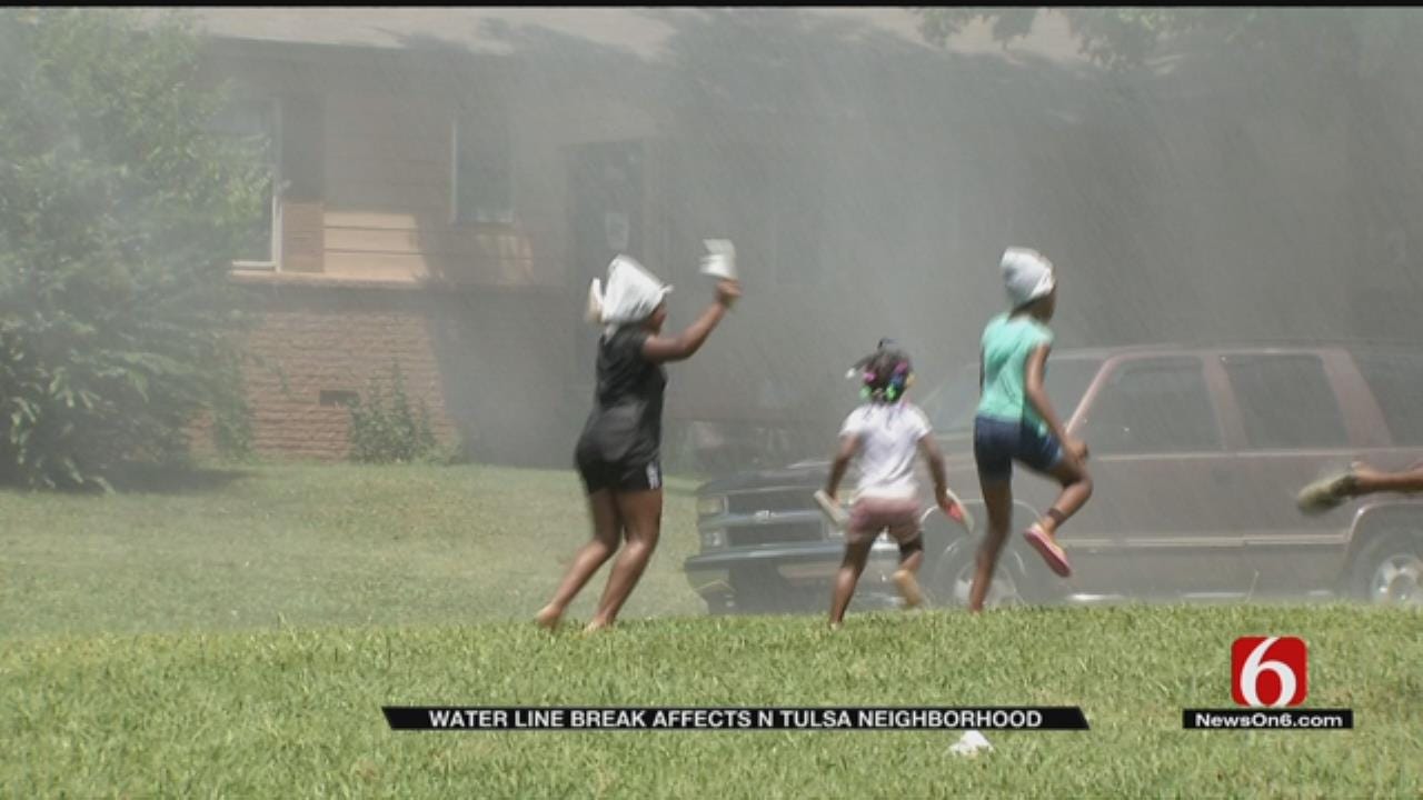Kids Enjoy Tulsa Water Line Break
