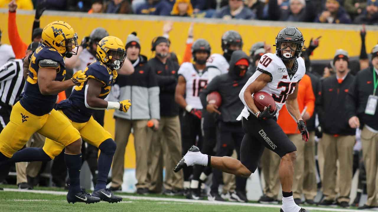 Brown Leads No. 22 Oklahoma State Over WVU 20-13