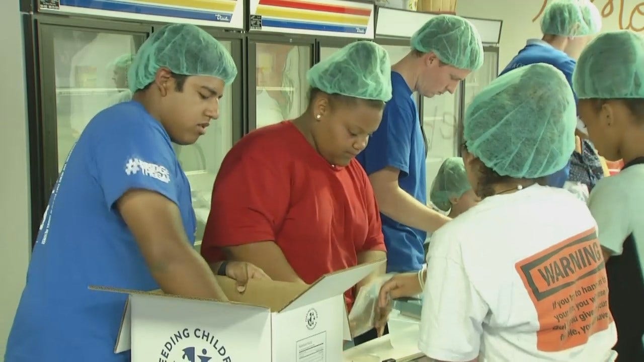 WEB EXTRA: Volunteers Packing Meals For Tulsa Neighborhood Residents