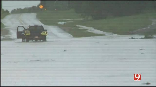 WEB EXTRA: Crews Push Vehicle Out Of Flood Waters