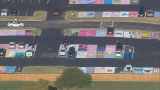 Jenks High School Seniors Share Excitement For New School Year, Painted Parking Spots