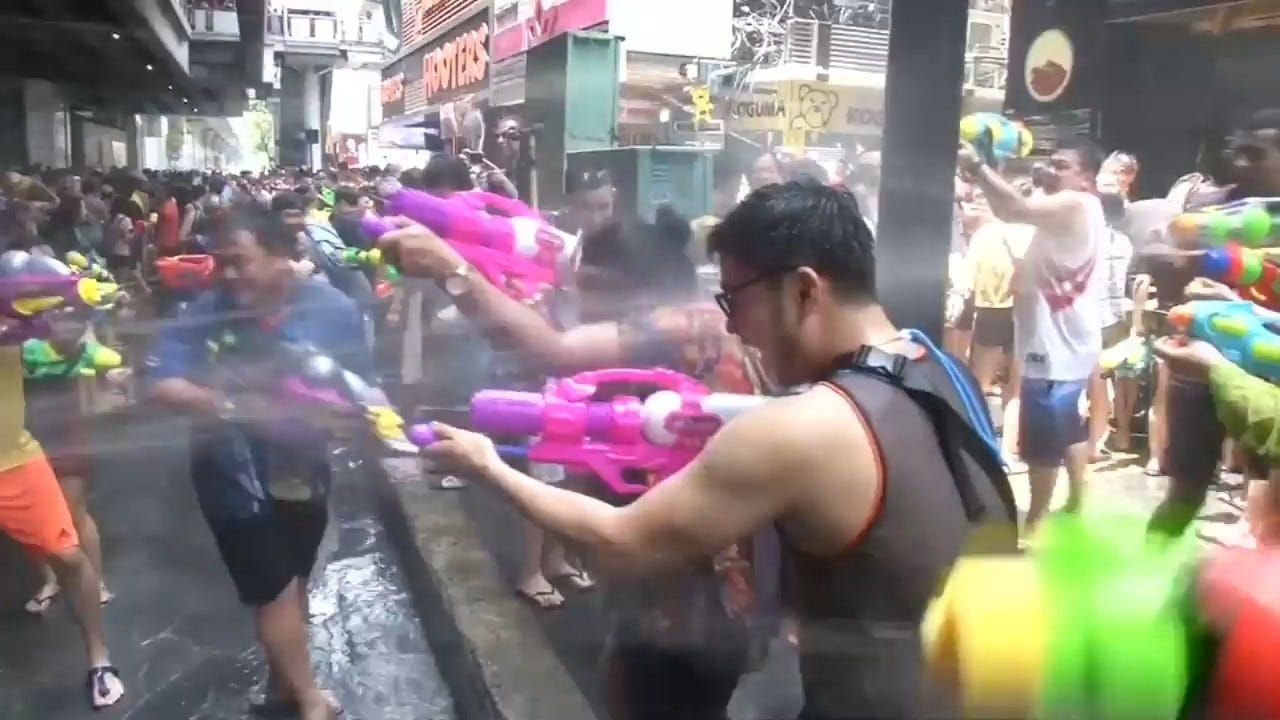 Bangkok Residents And Tourists Celebrate The New Year With Massive Water Gun Fight