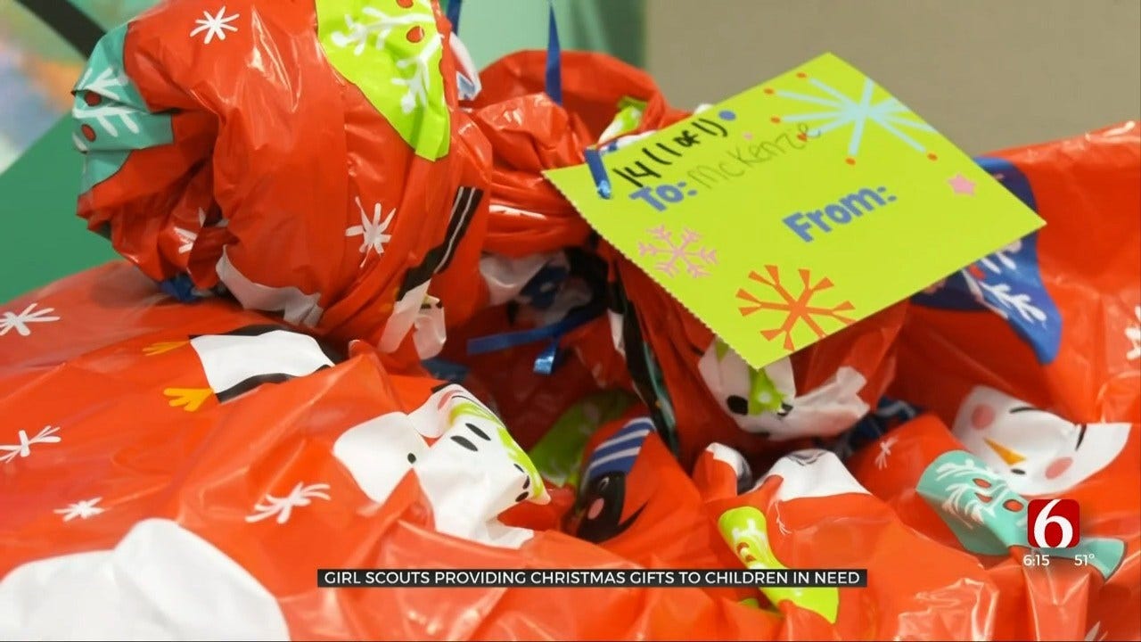 Trefoil Tree Event Provides Presents, Bikes For Girl Scouts, Siblings
